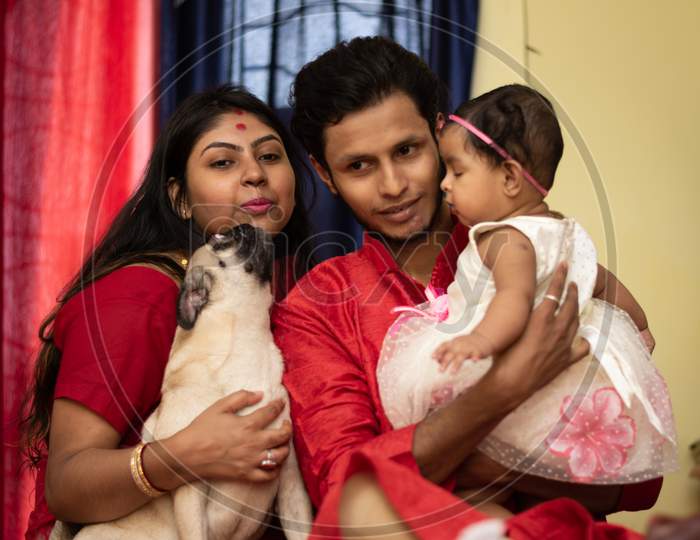 Indian family, child with parents and dog. Indian lifestyle