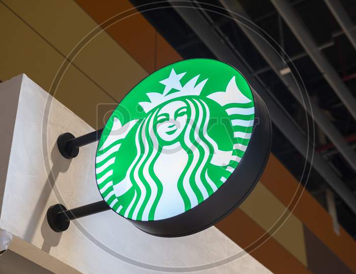 Florianopolis, Brazil. September 14, 2020: Sign Starbucks Coffee. Company Signboard Starbucks Coffee. Starbucks Is The Largest Coffeehouse Company In The World At Airport, Florianopolis - Brazil.