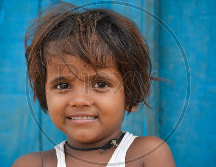 TIKAMGARH, MADHYA PRADESH, INDIA - SEPTEMBER 14, 2020: Portrait of a happy smiling child girl.
