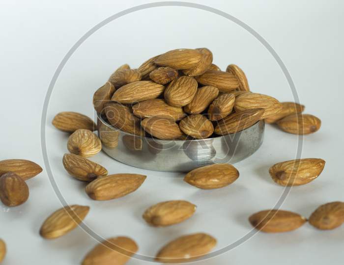 Almonds In A Container Lid Two