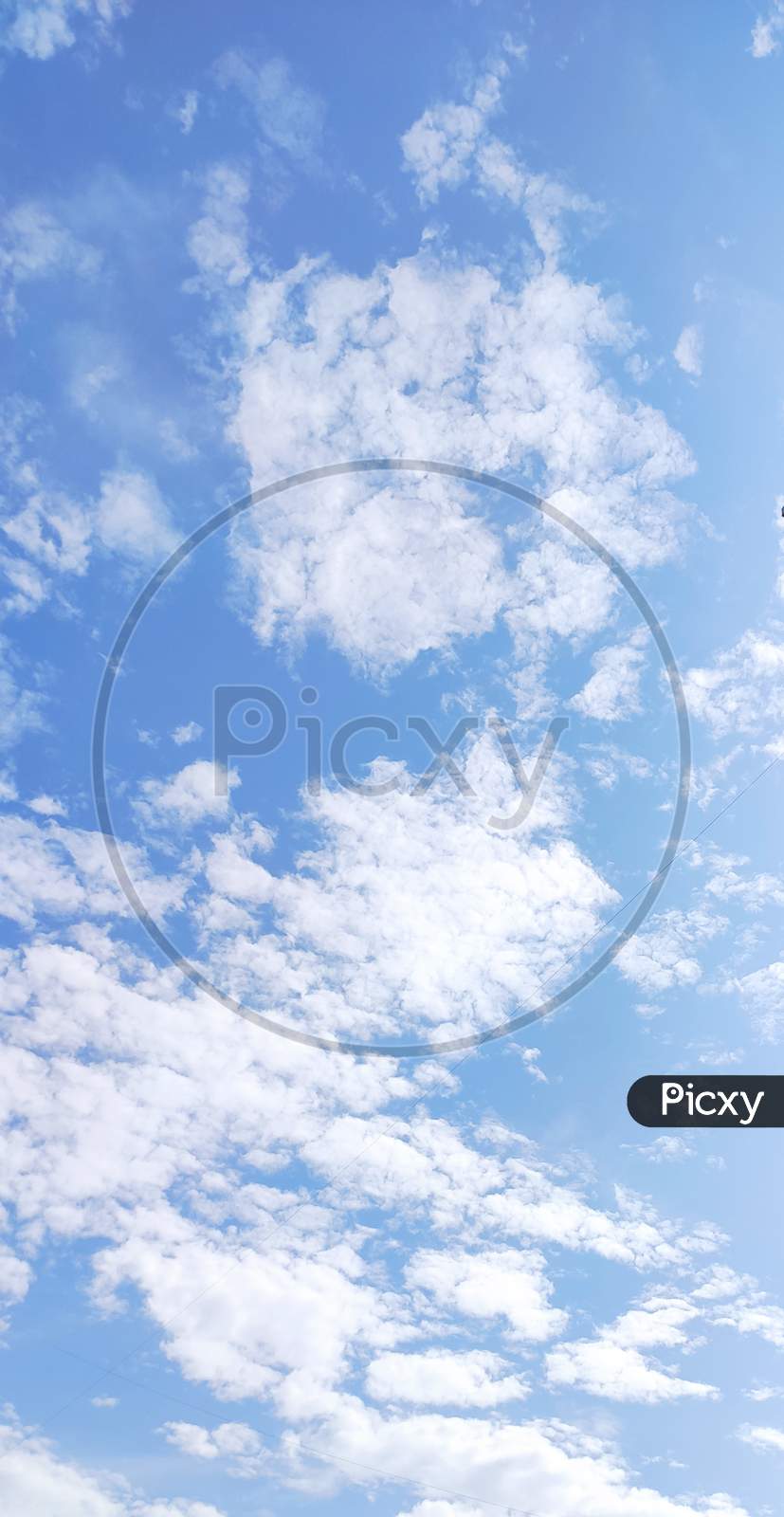 Sky Texture, Abstract Nature Blue Sky Background With Tiny Clouds. Panorama Image