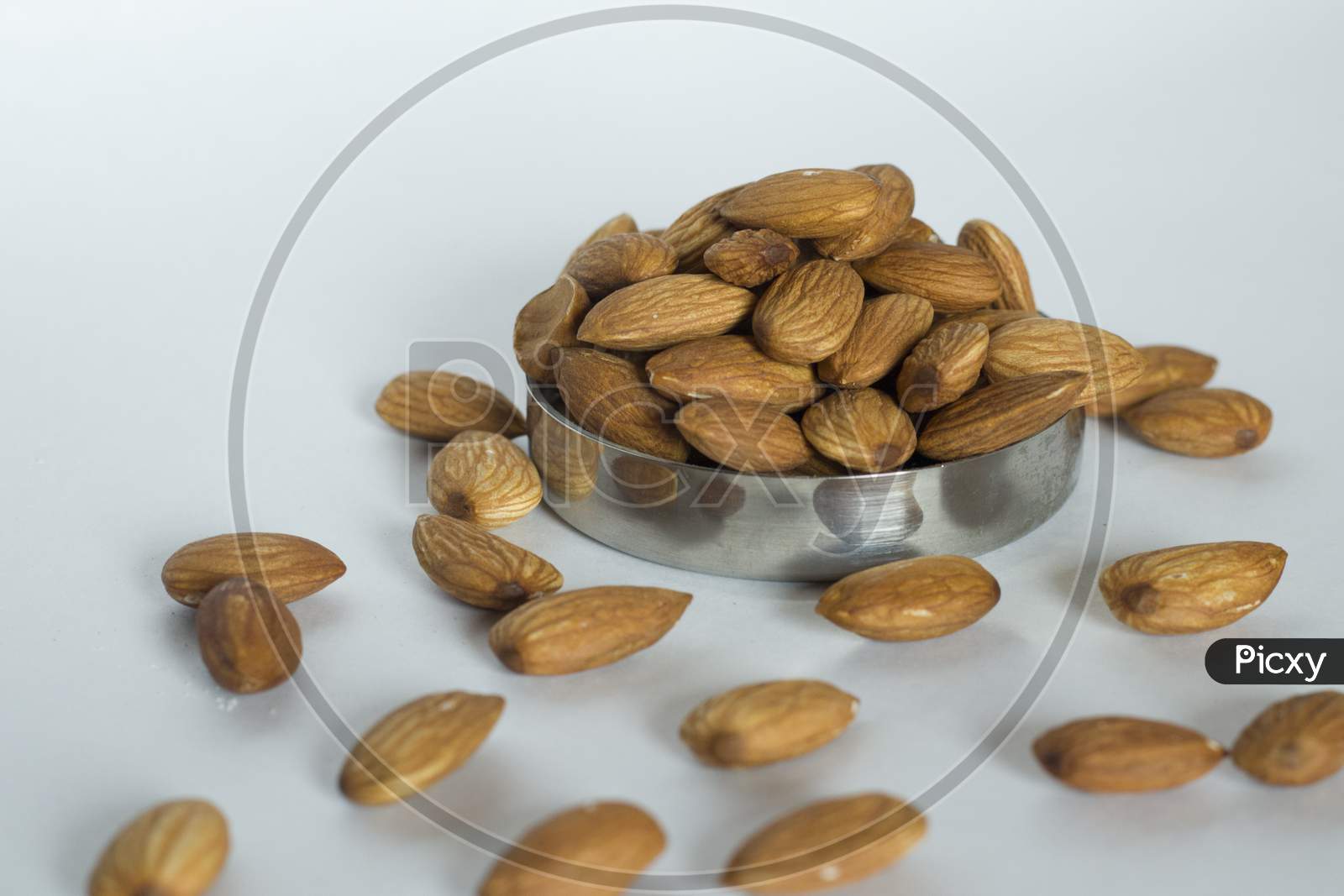 Almonds In A Container Lid One