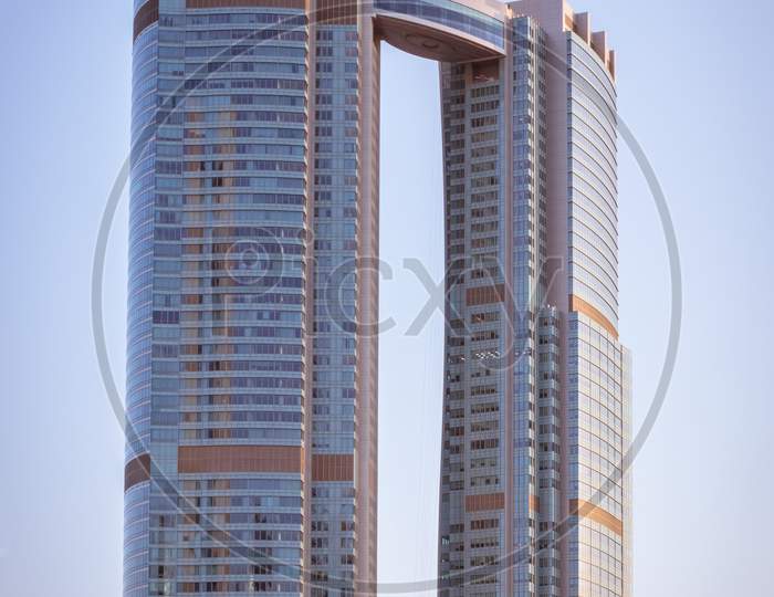 Abu Dhabi , Uae - 10 October 2020 : Capital City Of United Arab Emirates With Emirates Flag, Etihad Towers, Adnoc Head Office,Emirates Palace And Cityscape