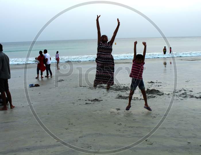 children enjoying at a beach