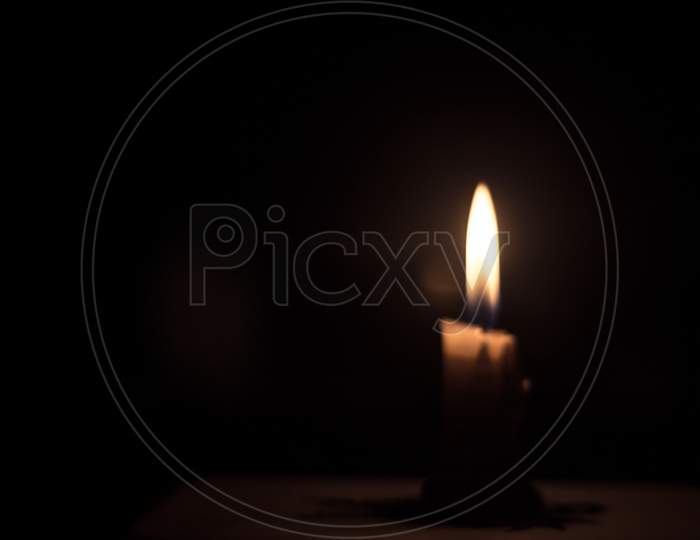 Candle In The Dark Background