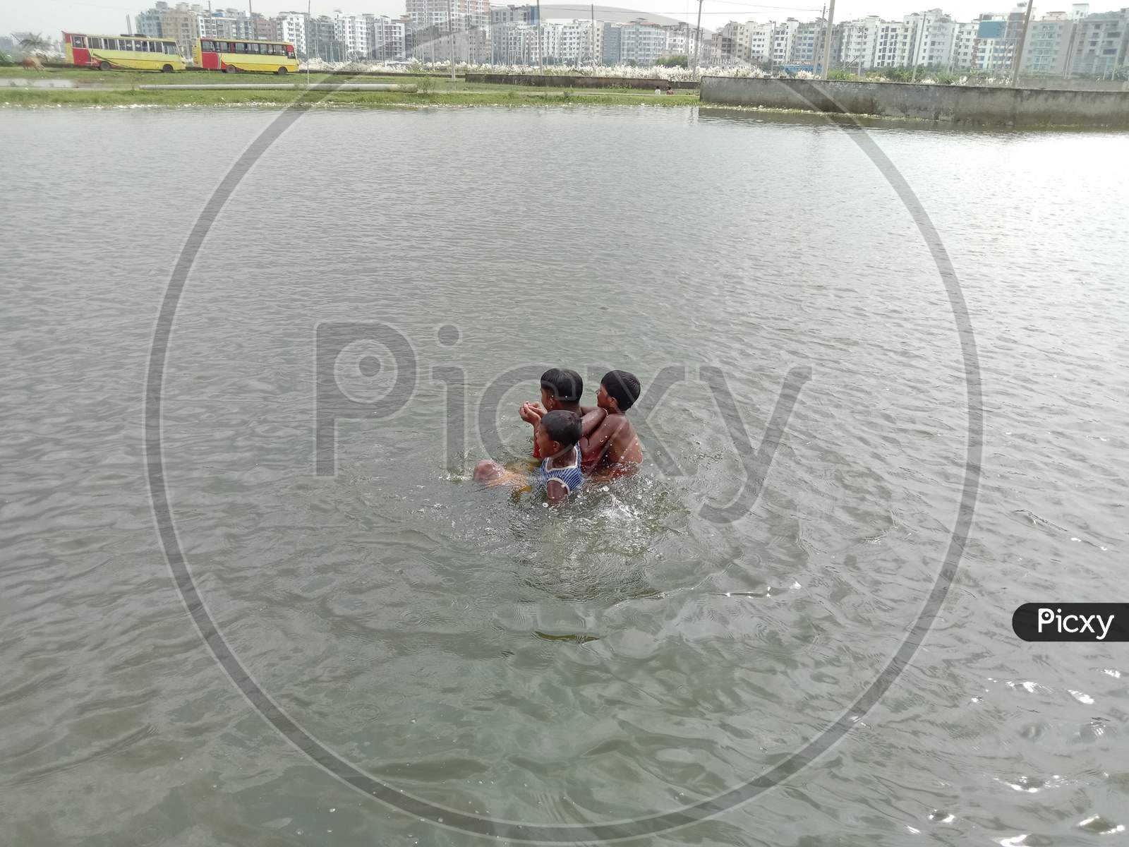 Childs Or Baby Swimming On Lake