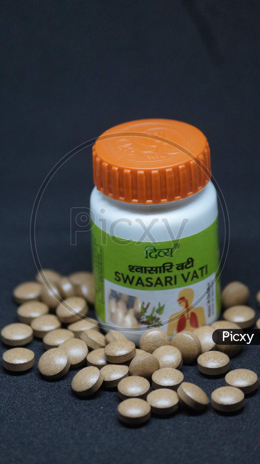 Selective focus of homeopathic medicine bottle.world homeopathy day.