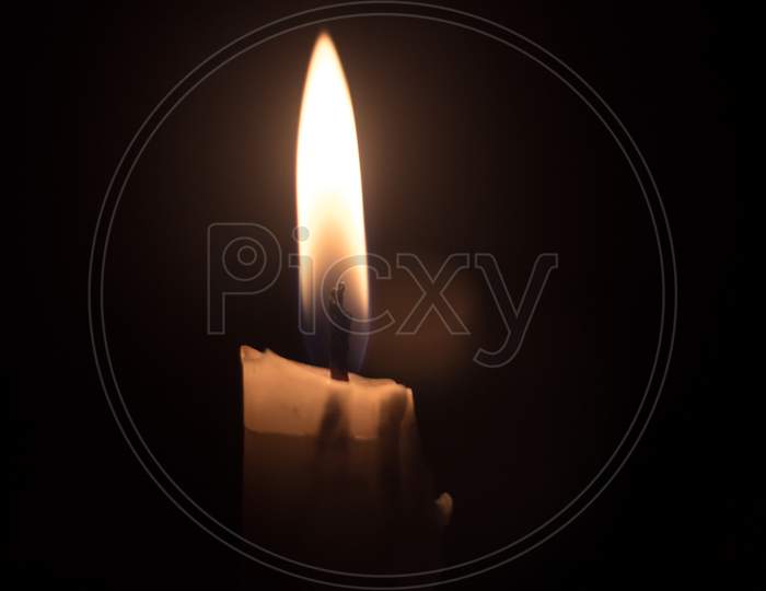 Candle In The Dark Background