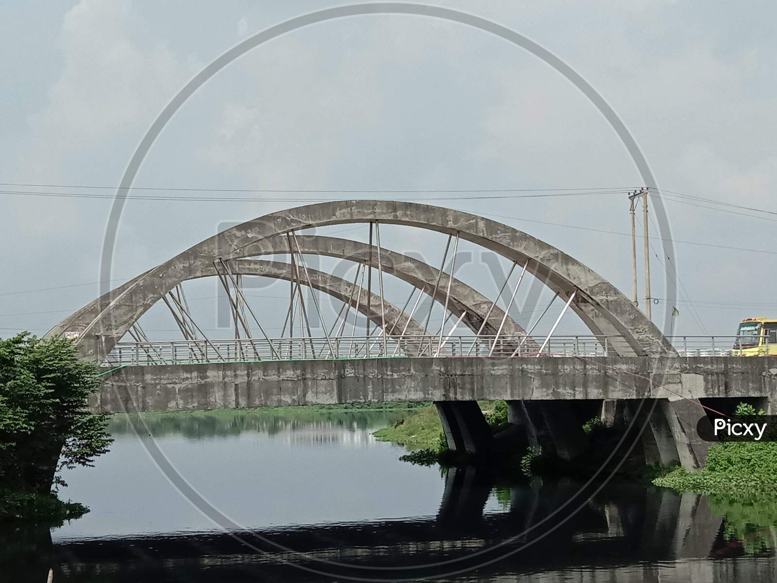 Stylish Steel And Concrete Bridge On Lake