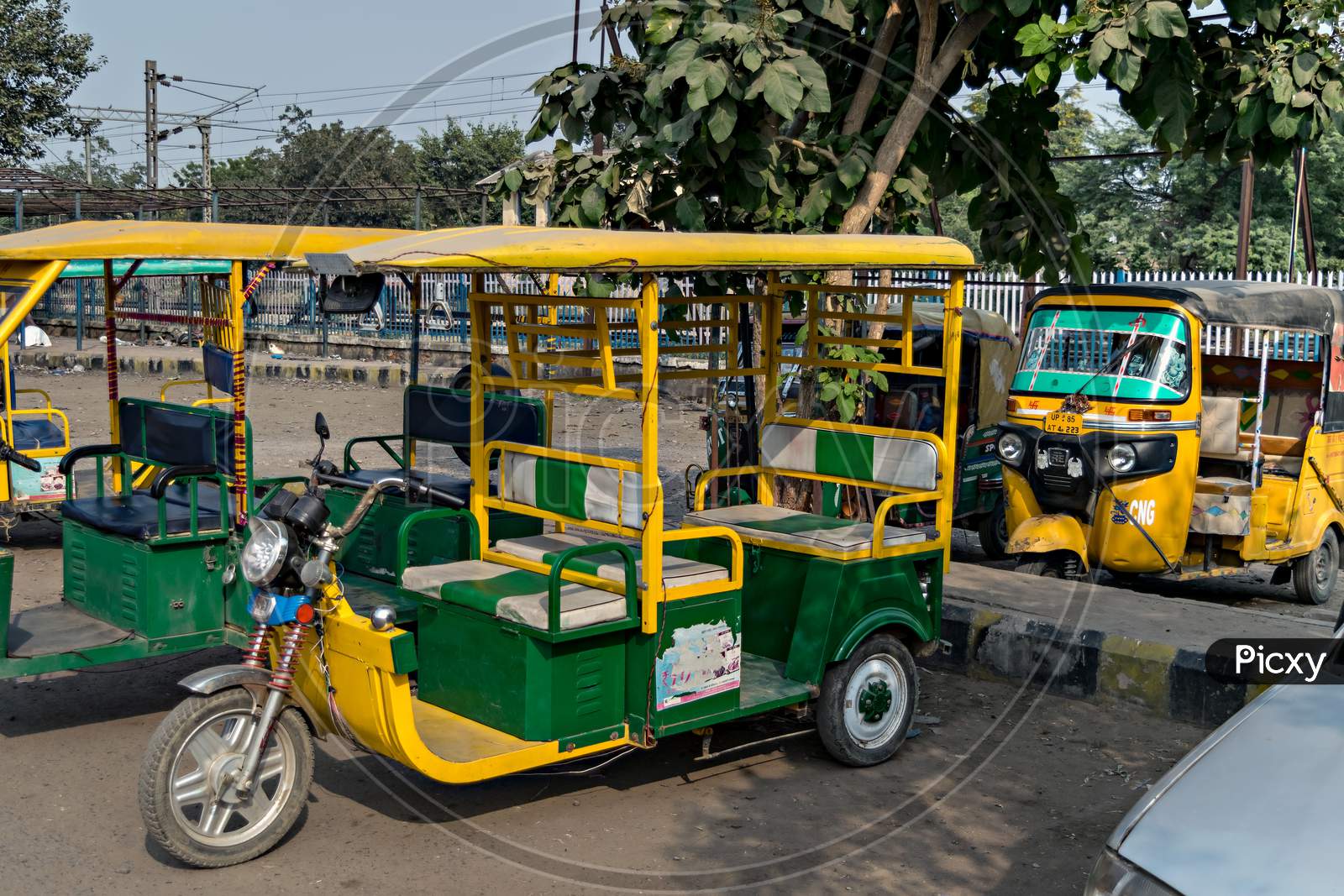 Electric Battery Operated & Old Gas Operated Three Wheeler Auto Rikshaw.
