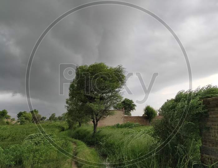 Cloudy weather in village. Natural beauty