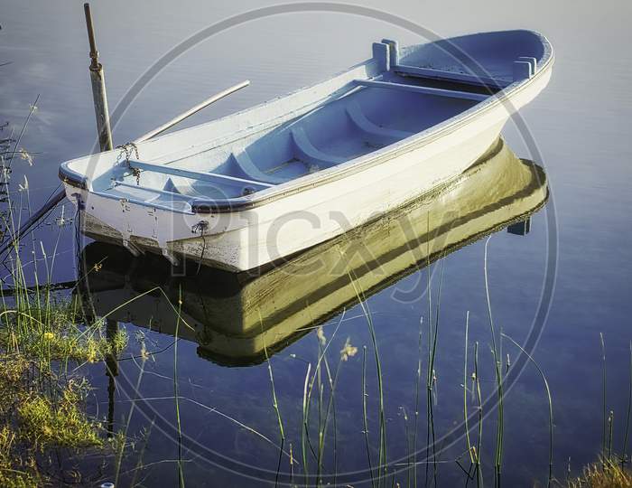 Abandoned Boat On Water