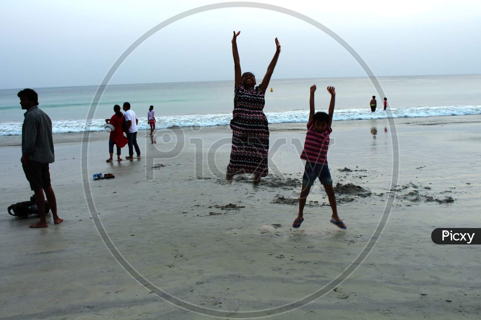 children enjoying at a beach