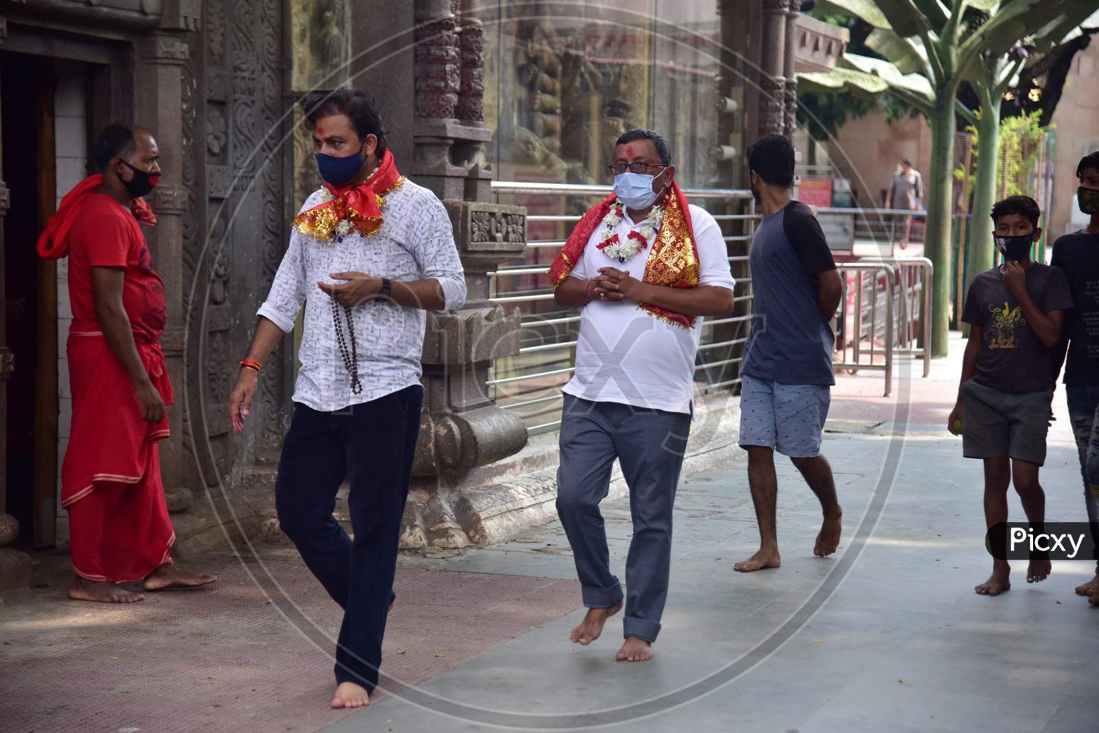 Indian devotees arrived Kamakhya temple after re-opens for public after a gap of nearly six months due to coronavirus lockdown with certain restrictions, in Guwahati, India on October 11, 2020