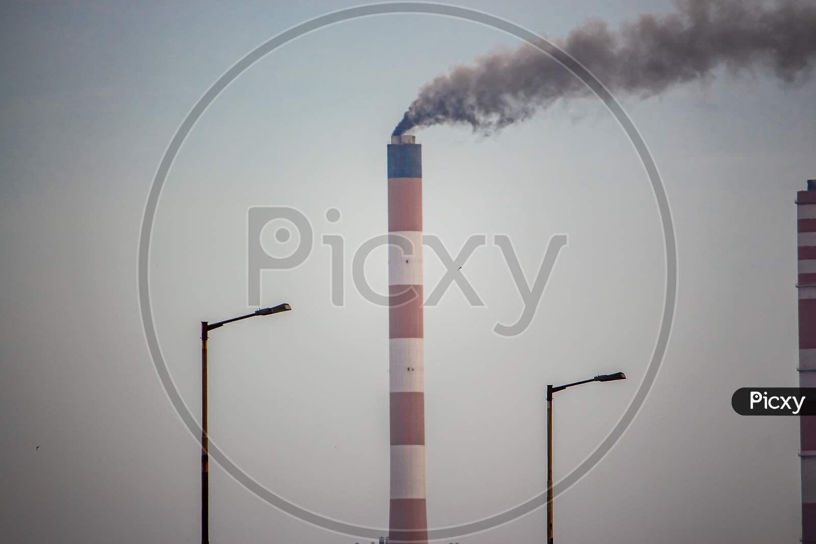 Industrial Landscape - Smoke From The Pipes Of Heat Station With Carry Out Harmful Emissions.Petrochemical Factory Chimney.Its Held To Increasing Global Warming. Pollution City Chemical Industries.