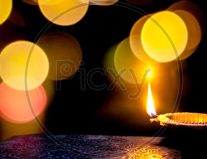 Traditional Clay Oil Lamp On Dark Background, Copy Space.