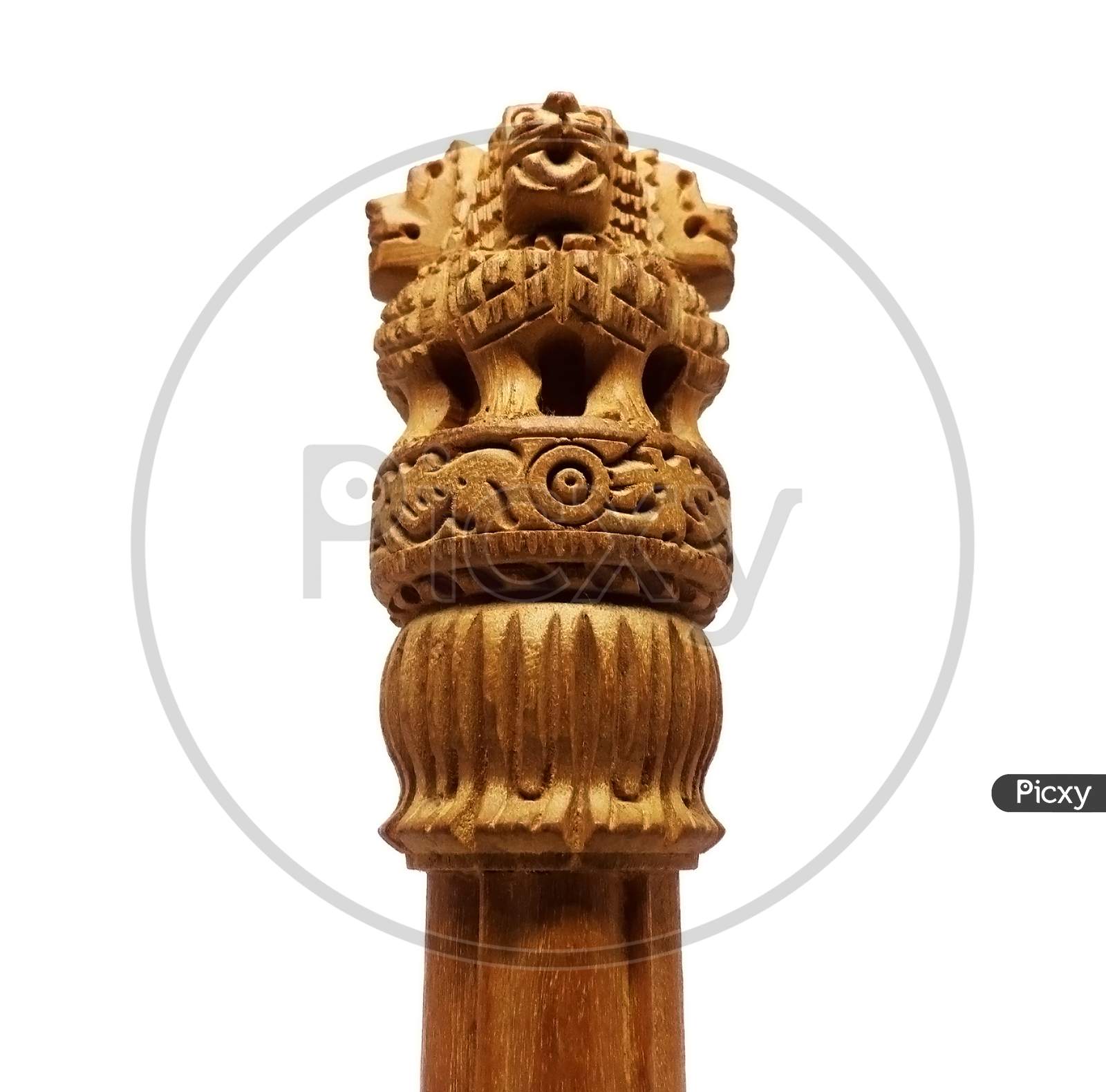 Wooden replica of Indian national emblem lion face Ashoka Stambha isolated on white background