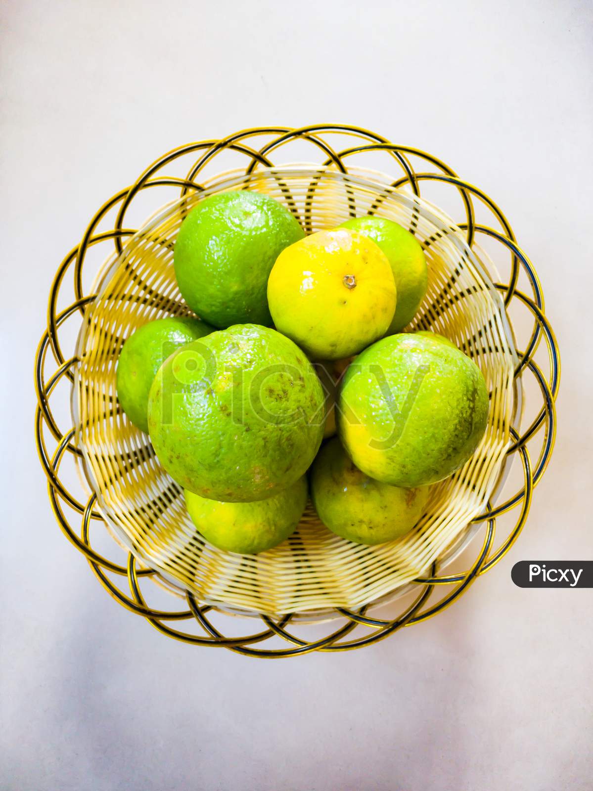 Fruit basket and beautiful mosambi fruit in it