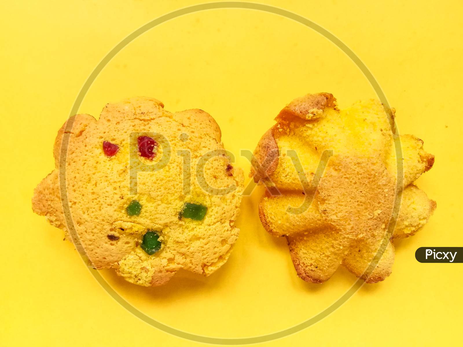 Yellow star shaped cakes in yellow background