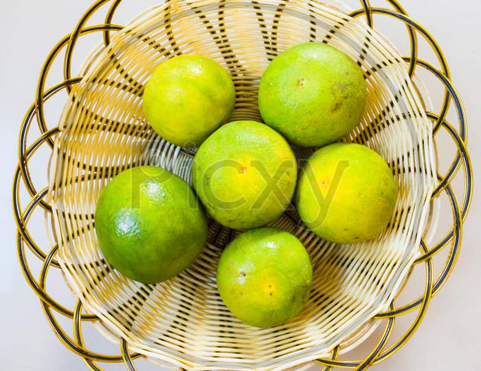Fruit basket and beautiful mosambi fruit (sweet lemon)
