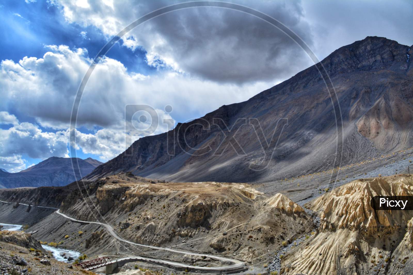 A bridge and a mountain road in Spiti Valley, Himachal Pradesh