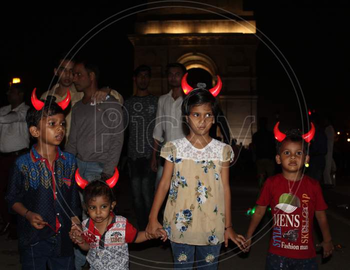 Evening View Of Tourist On Historical Place India Gate.