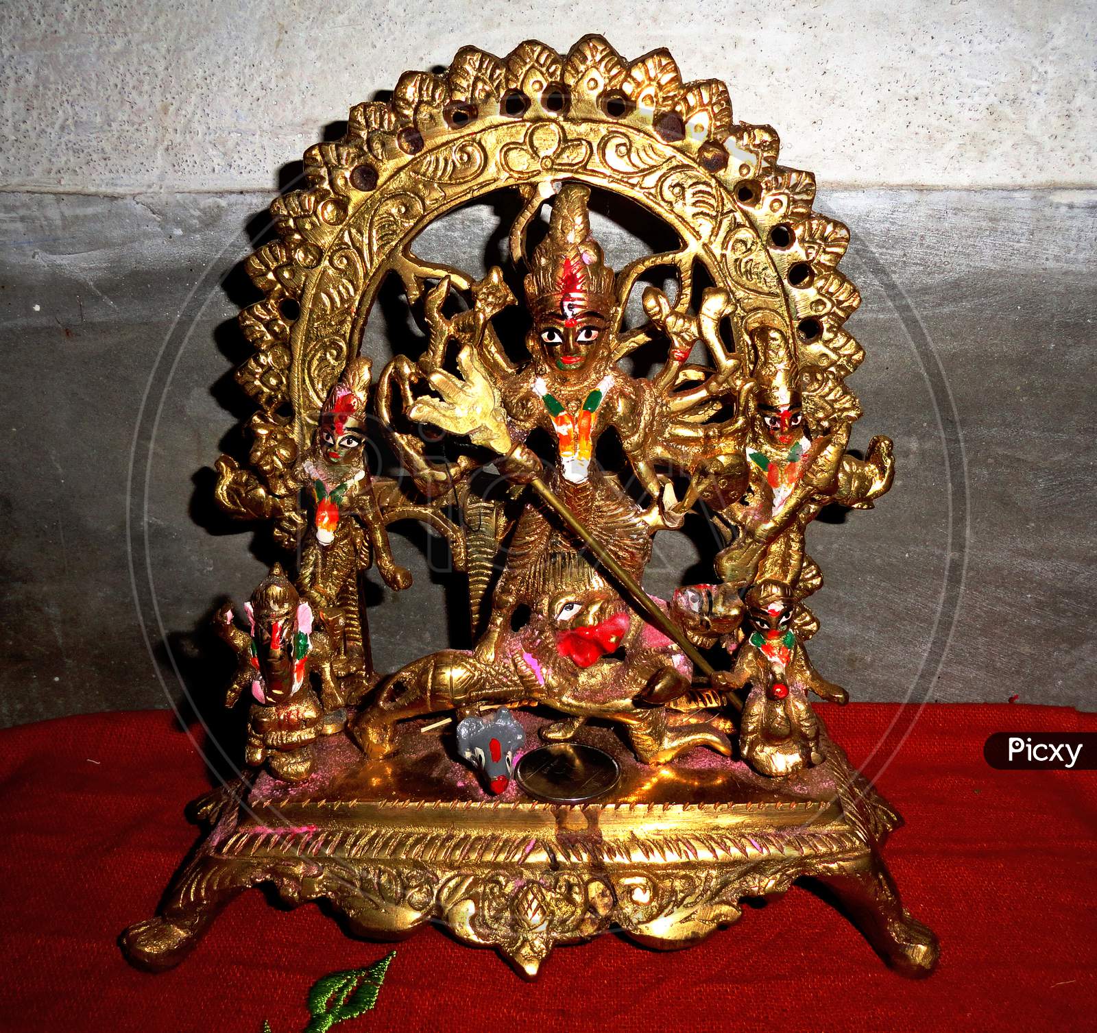 Brass sculpture of hindu goddes durga at her Mahishasura Mardini posture