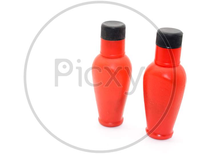 A Picture Of Bottles On White Background
