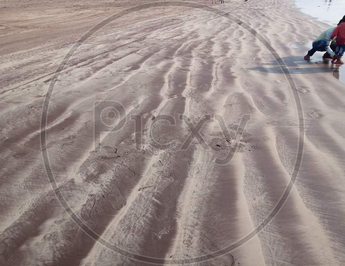 Sand wavey pattern on beach
