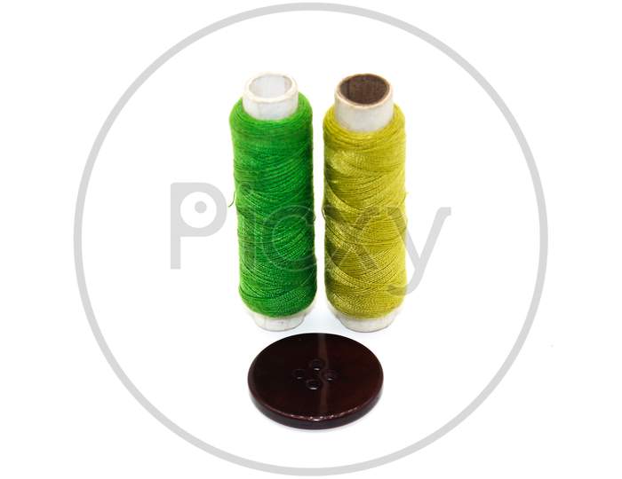 A Picture Of Thread Roll With White Background
