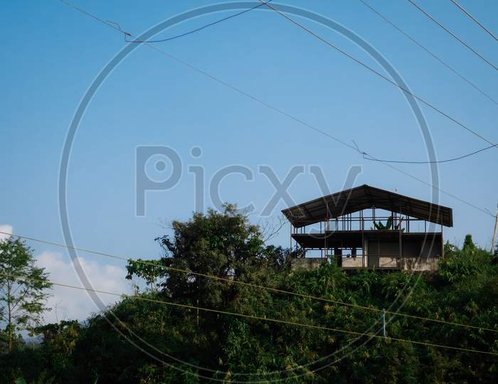 A under construction house on top of a hill