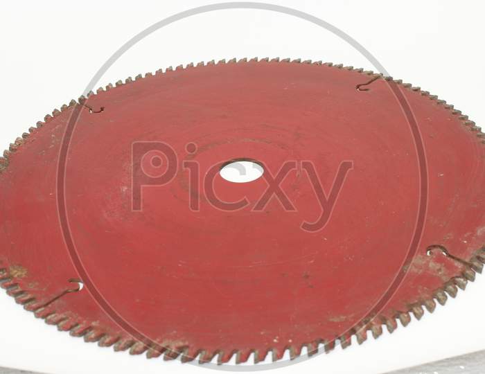 A Picture Of Steel Rod Cutter Blade On White Background
