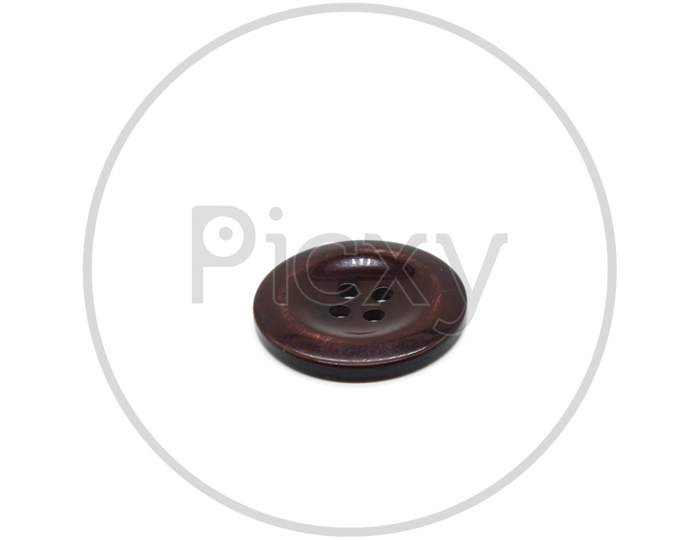 A Picture Of Cloth Button On White Background
