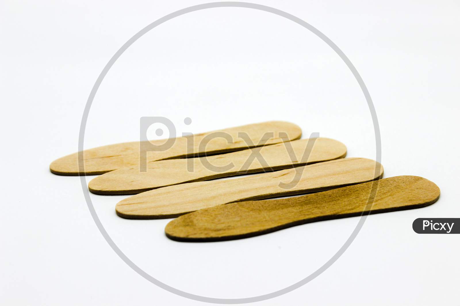 A Picture Of Wood Spoon On White Background