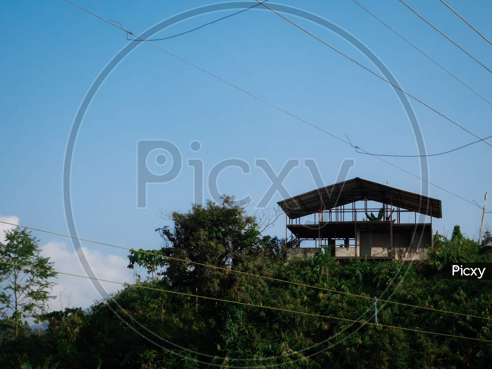 A under construction house on top of a hill