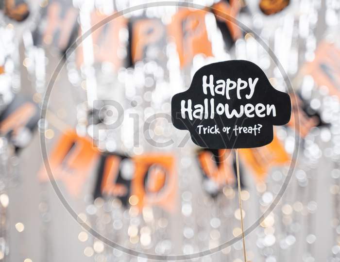 Happy Halloween And Trick Or Treat Signage Booth Prop On Decorated Background - Concept Of Holiday And Halloween Festival.