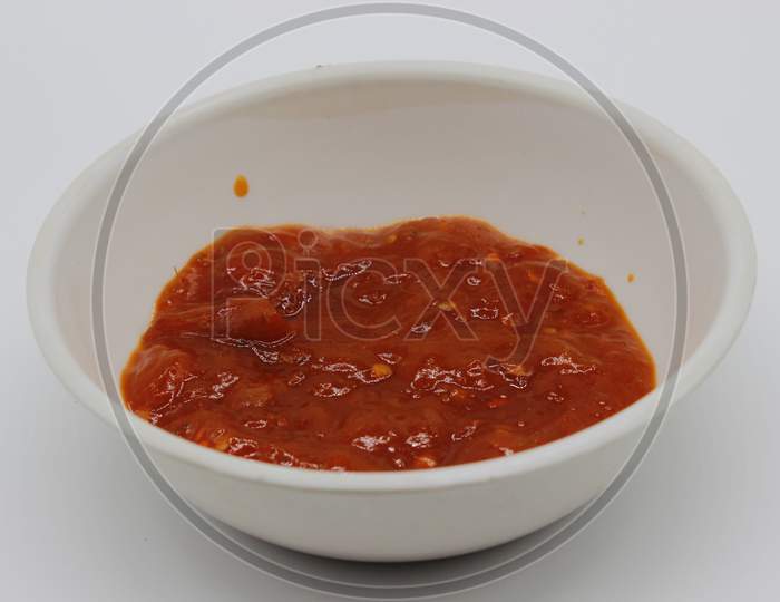 A Picture Of Tomato Sauce In Bowl