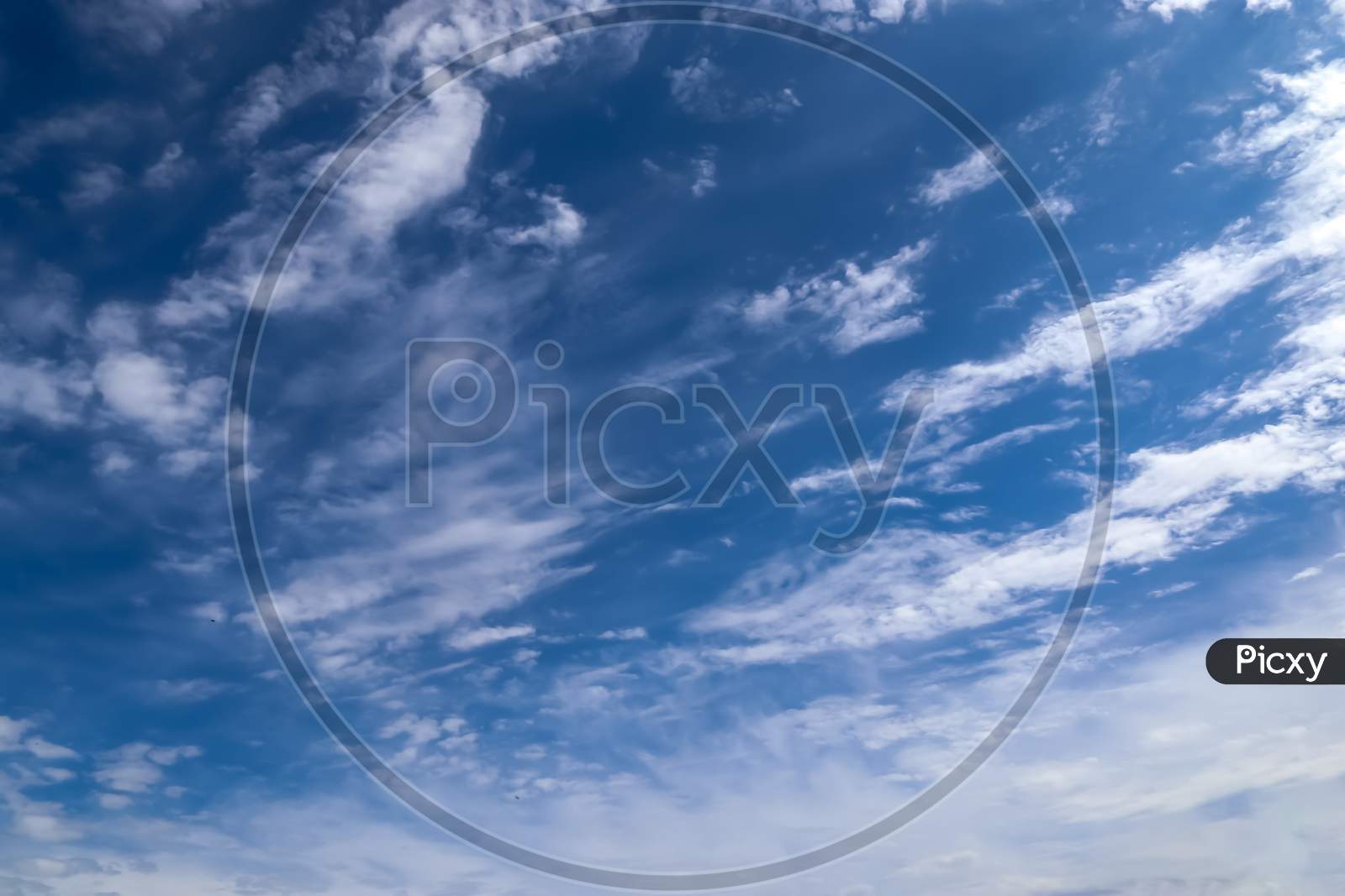 Stunning Cirrus Cloud Formation Panorama In A Deep Blue Sky