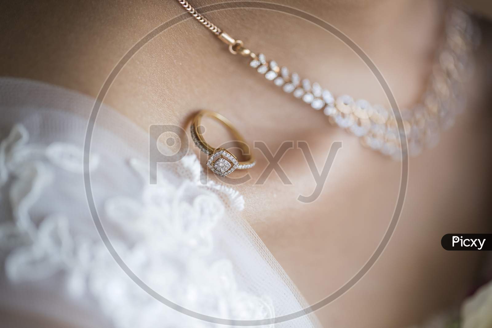 a wedding ring is placed on the beauty bone of a bride