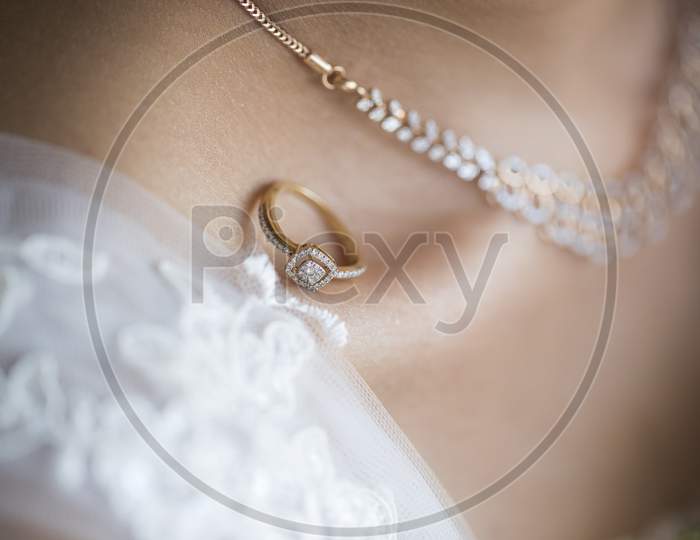 a wedding ring is placed on the beauty bone of a bride