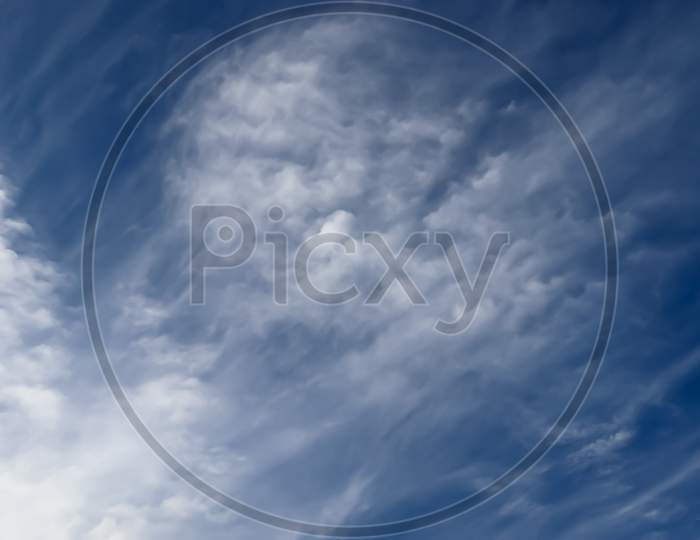 Stunning Cirrus Cloud Formation Panorama In A Deep Blue Sky