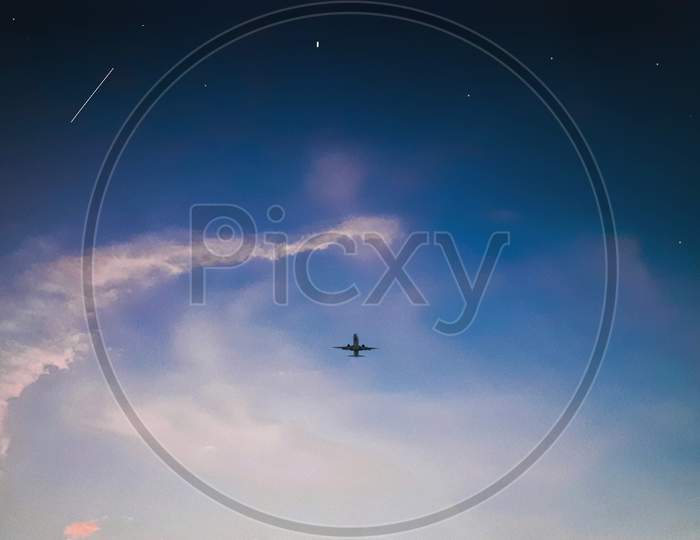 Airplane with the Dark blue Sky photo