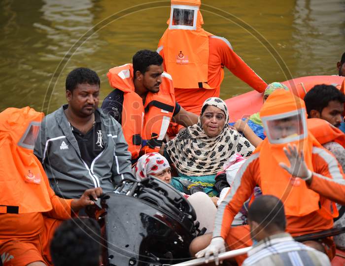 A woman seen crying while the NDRF teams rescue her from the floods after her house got inundated in the flood water in Al Jubail Colony, Falaknuma,Hyderabad, October 14, 2020