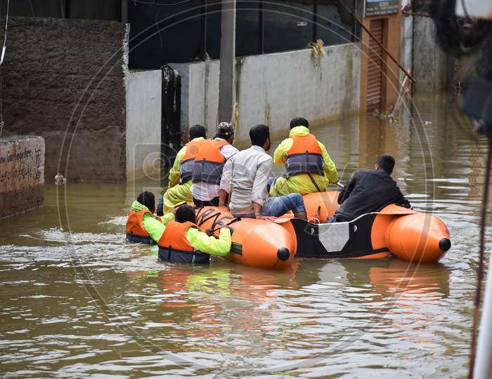 GHMC DRF teams rescue flood affected families in flood affected Al-Jubail Colony of Falaknuma in Hyderabad on October 14, 2020.
