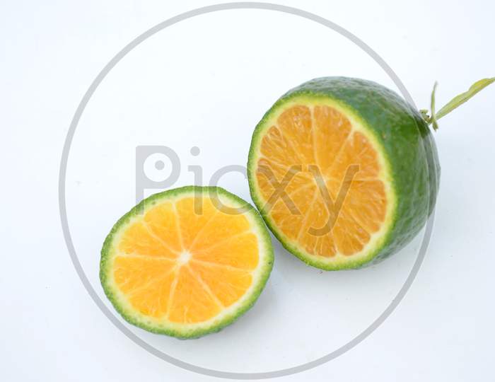 Sliced Orange Fruit Isolated On White Background.
