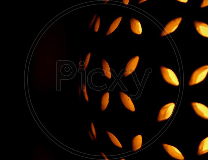 Abstract pattern design of Halloween light glowing poster, card, fire flakes