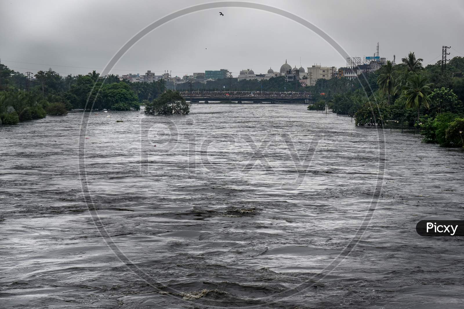 Musi River flowing in its prime after being released from Himayat Sagar Dam causing severe inundation in low lying areas on October 14, 2020, Hyderabad.