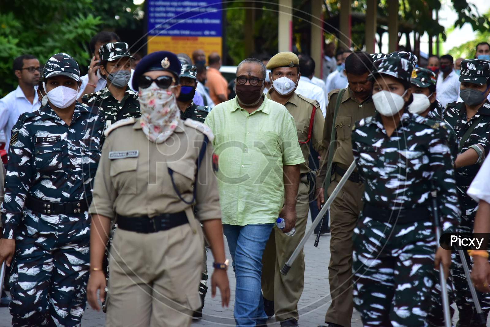 Retired Assam DIG PK Dutta, accused in the police recruitment examination paper leak scam  being produced to a court, in Guwahati on Oct 16,2020.