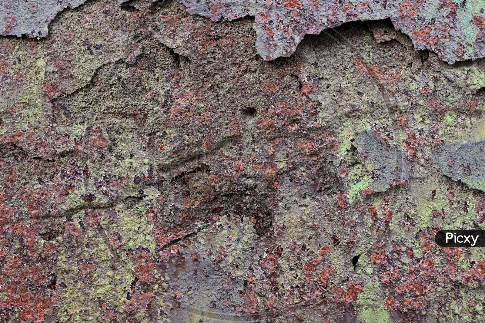 Detailed Close Up View On Aged Concrete Walls With Cracks And Lots Of Structure