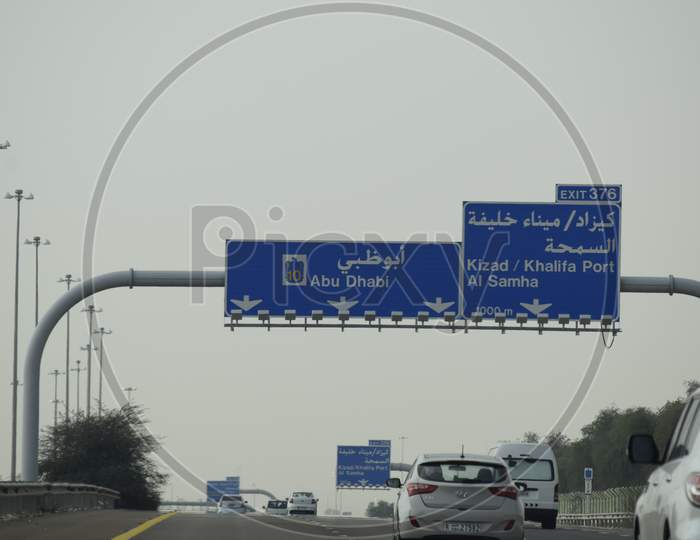 View Of Road Traffic Sign Board Over The Vehicle